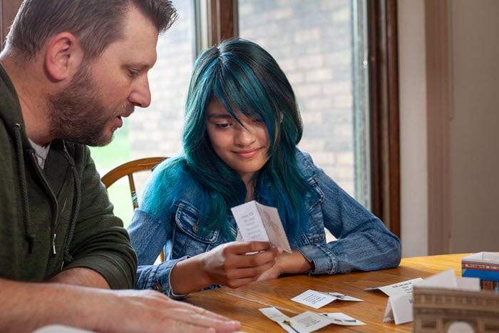 girl-doing-activity-with-dad girl-doing-activity-with-dad